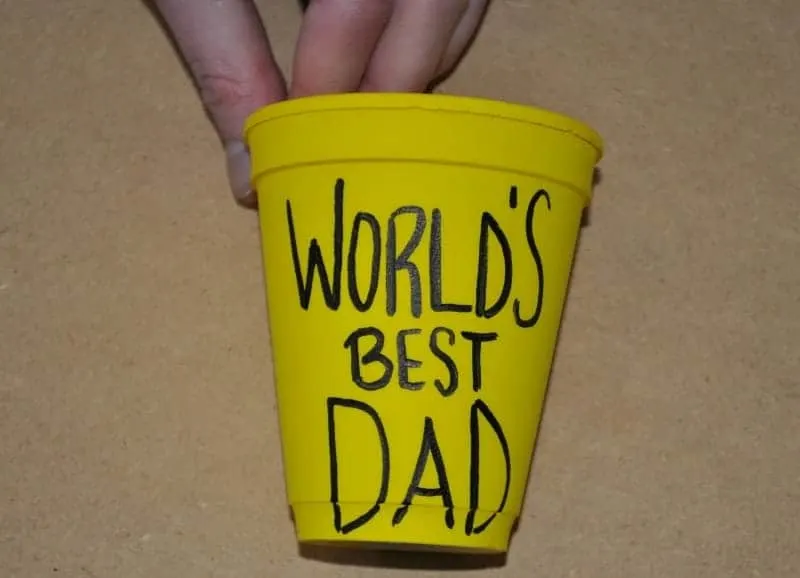 Write world's best dad on the cup