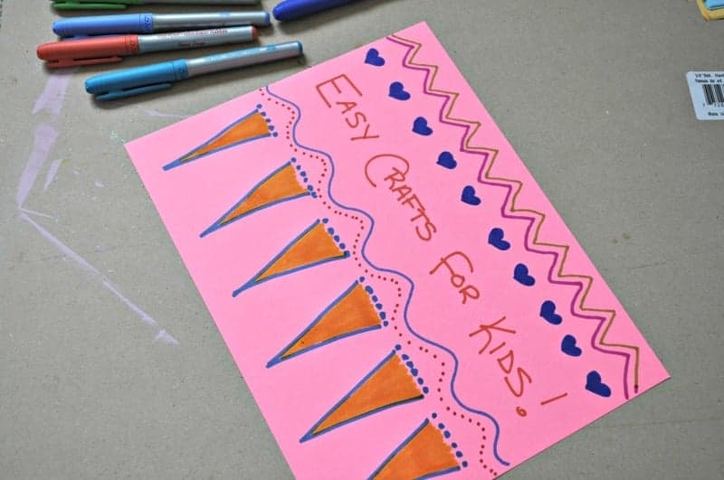 Decorate paper with markers or crayons