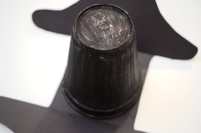 Glue styrofom cup to the folded paper