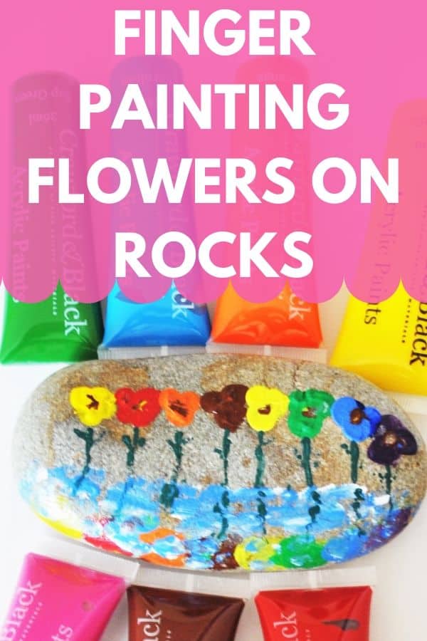 Finger painting flowers on rocks is a great activity for rainy or sick days, when your little one can't get out. Or, when they are bored and in the mood to be messy ;) #rockpainting #fingerpainting #painting #funactivity #kidsfun #paintingrocks