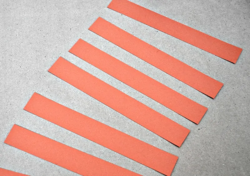 Orange strips of paper