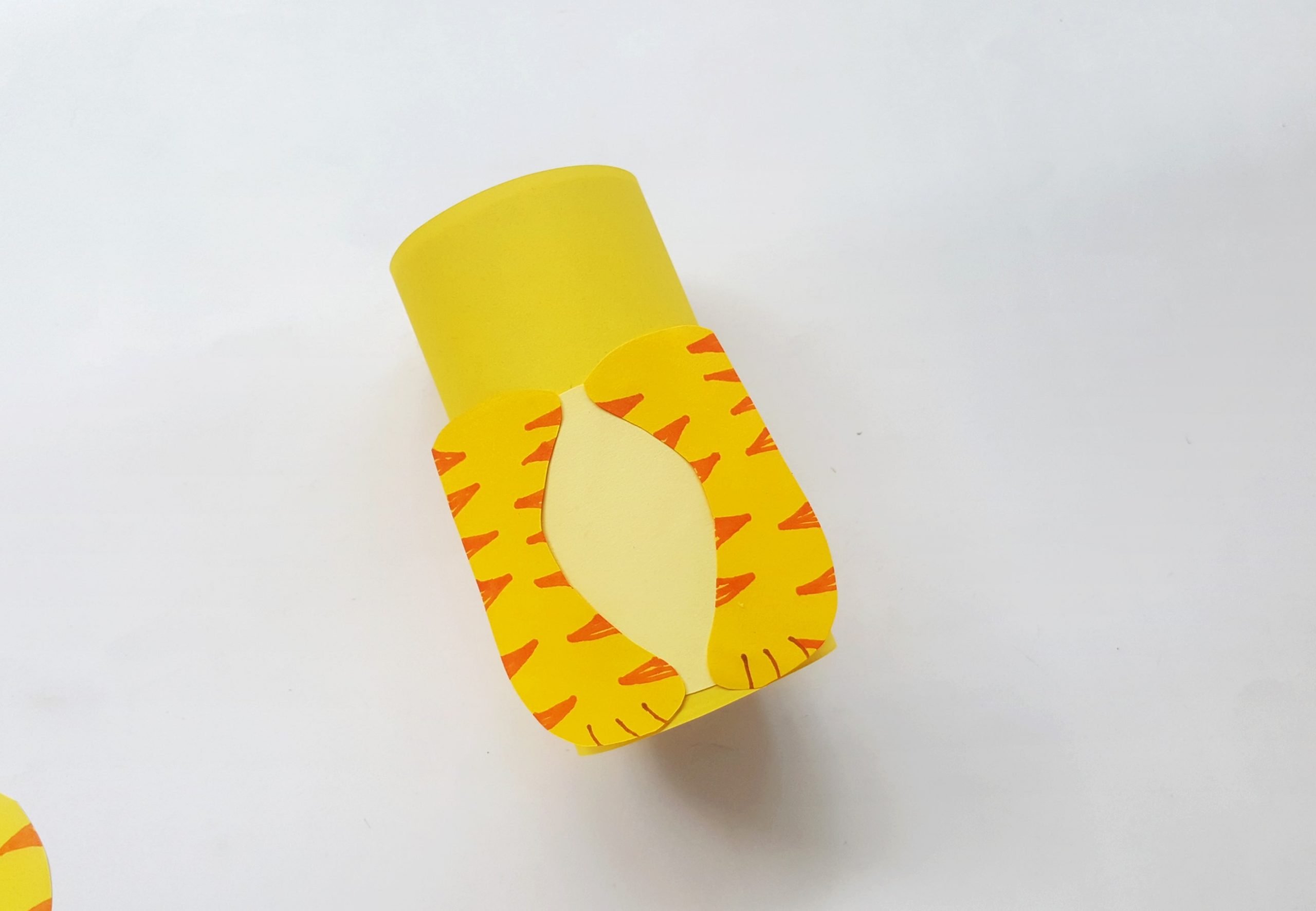 Tiger Toilet Paper Roll Craft with paper and scissors
