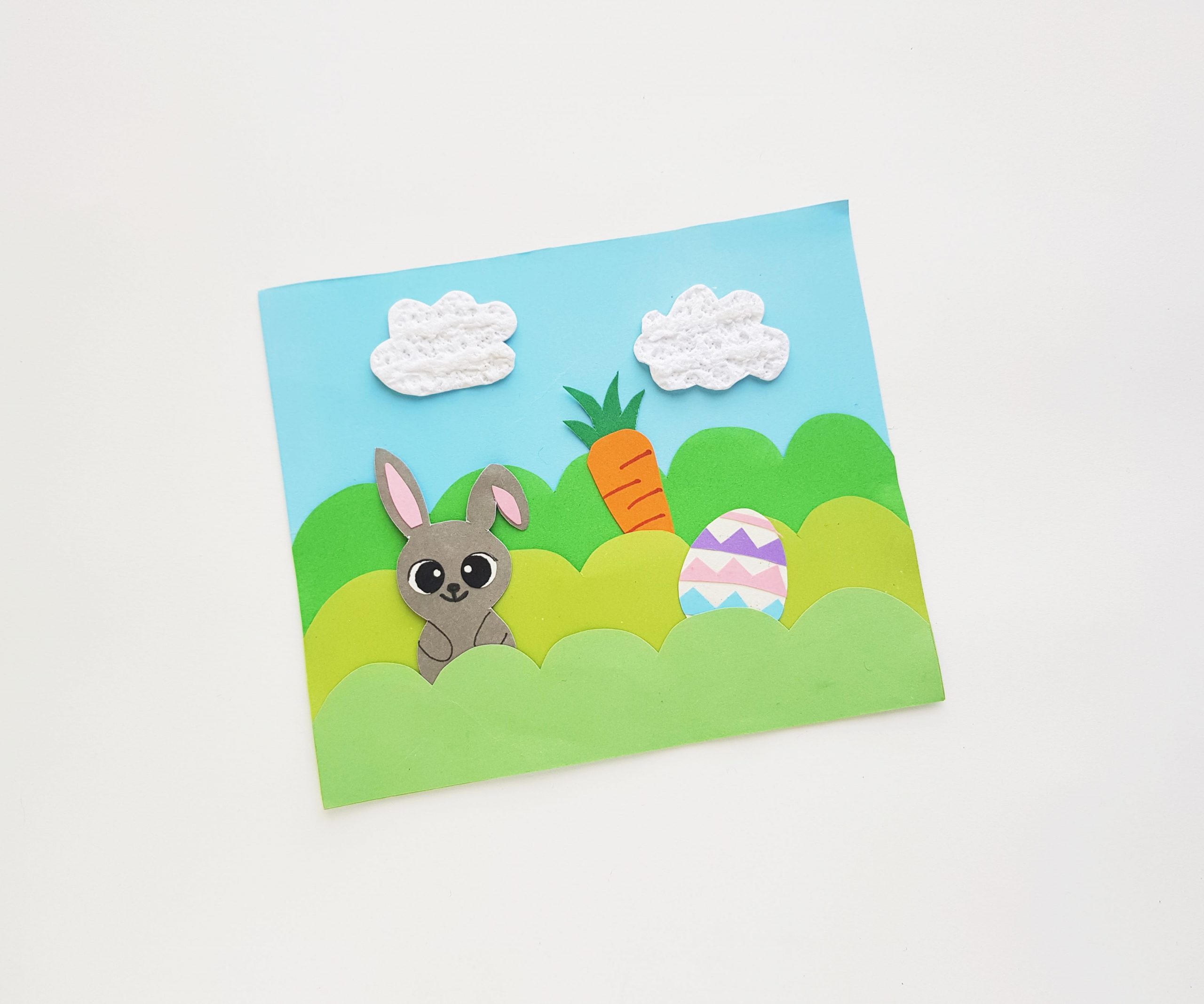 Easter scene craft with bunny, carrots and egg