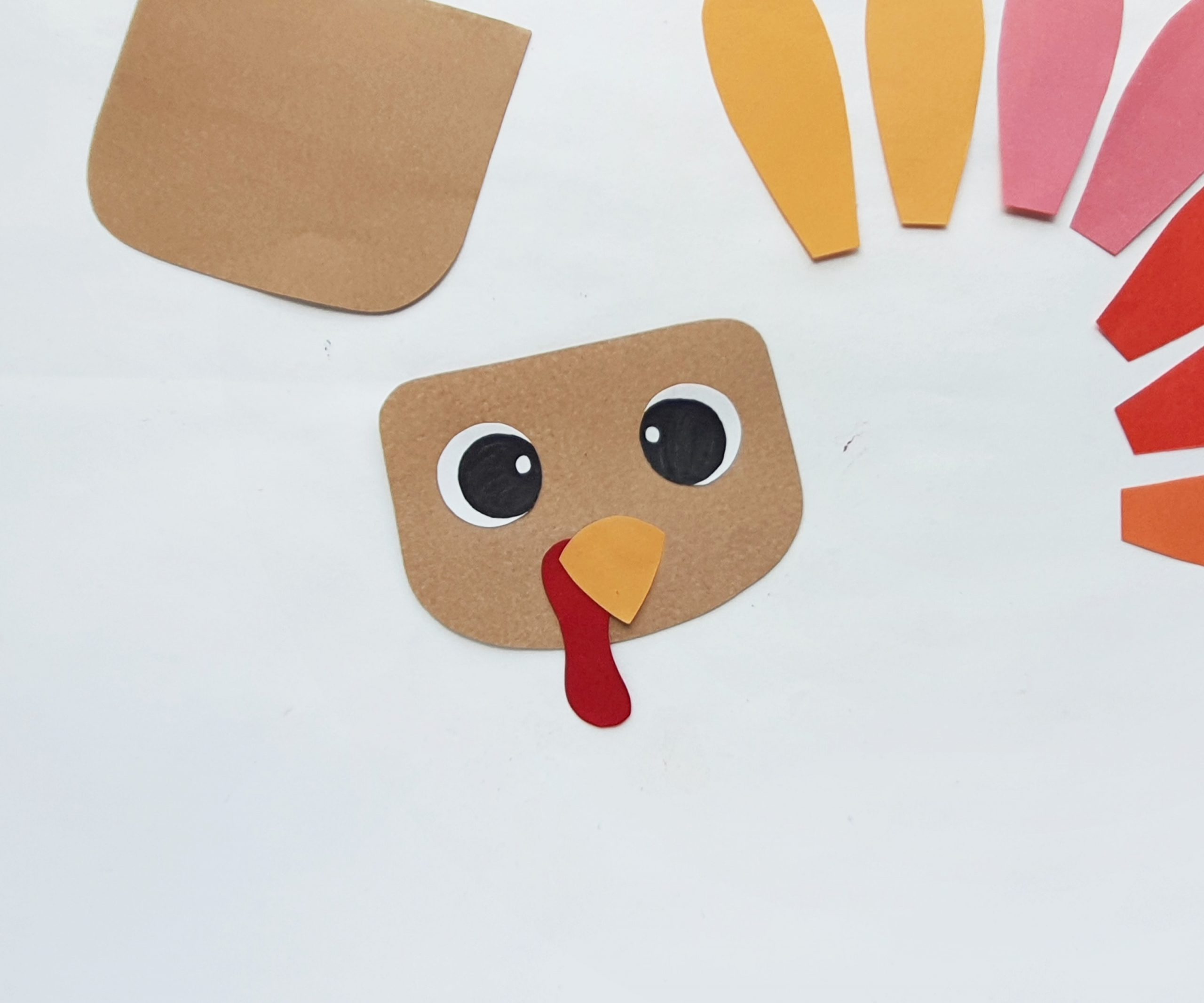 how to make a turkey puppet from a paper bag