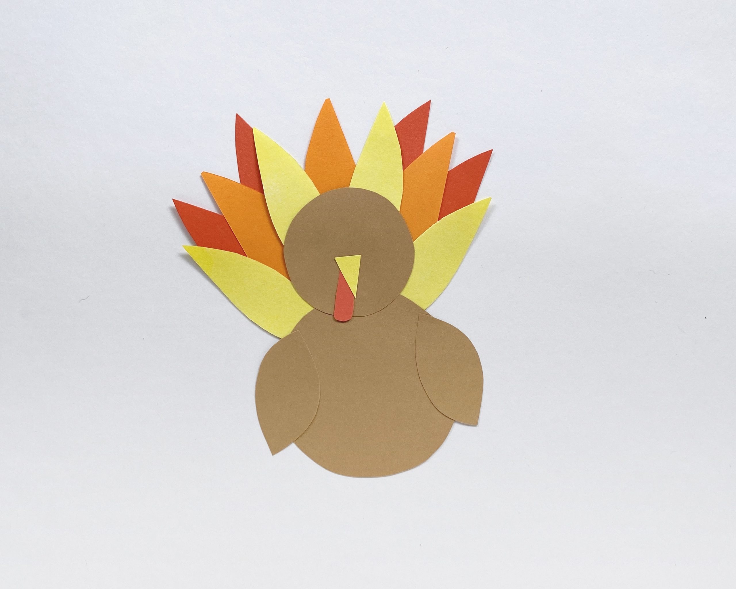 how to add feathers to paper turkey