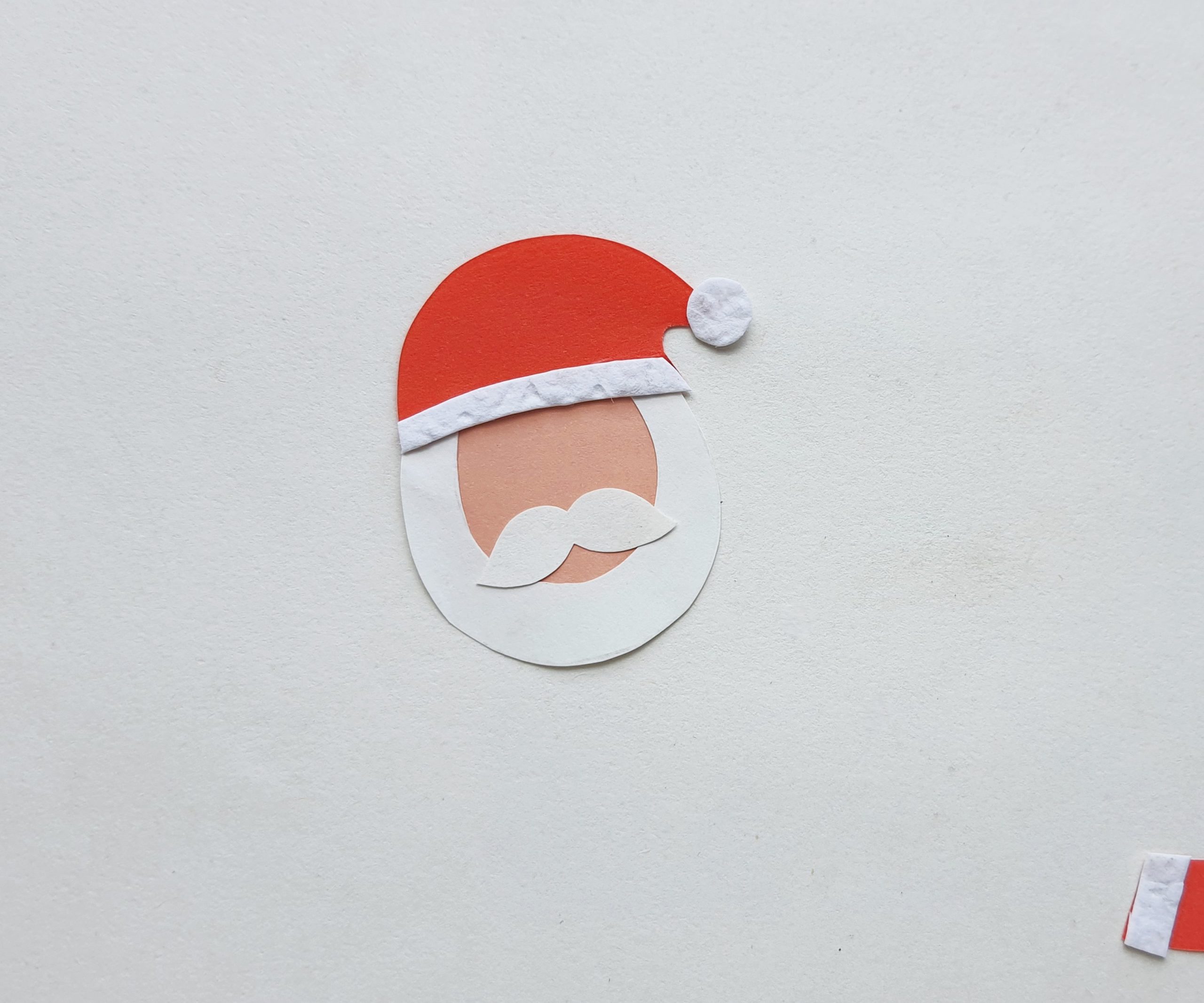 how to make a paper Santa Bookmark