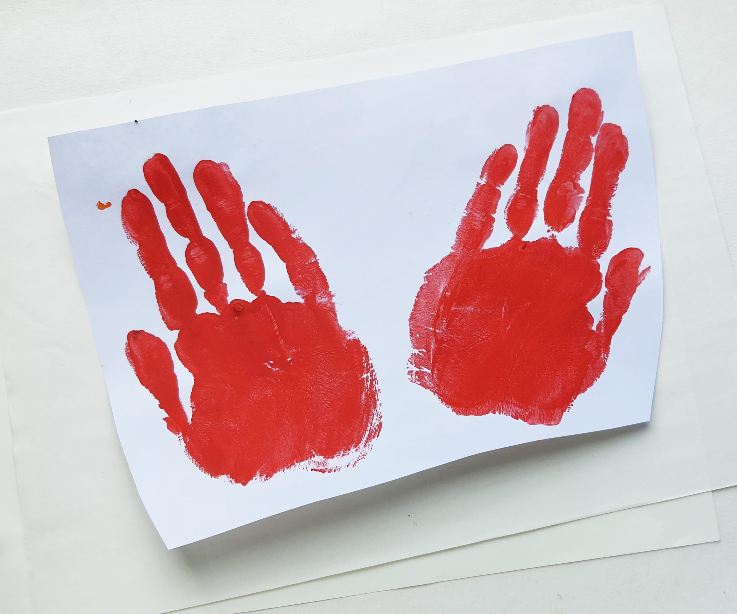how to make a butterfly from handprints