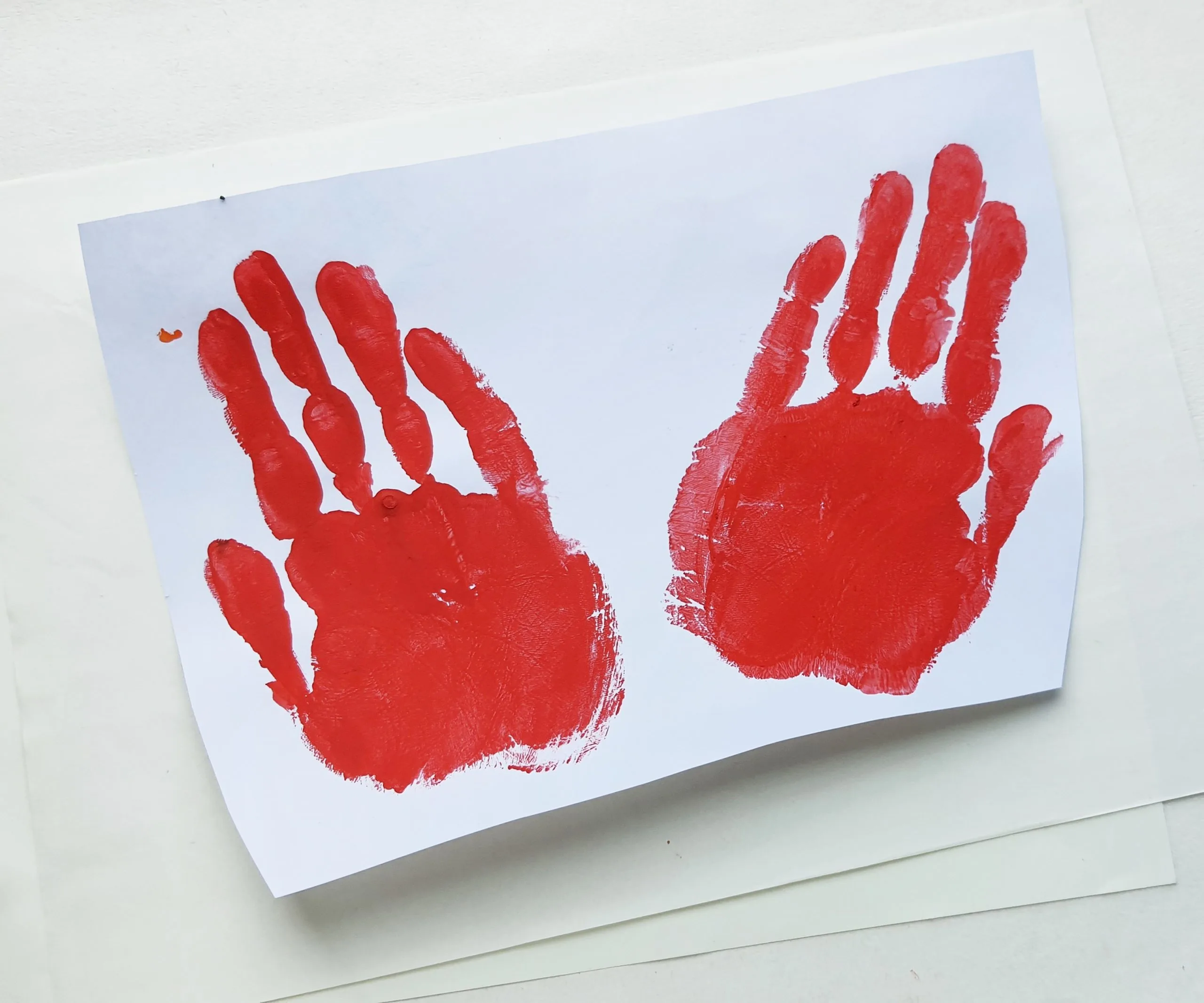 how to make a butterfly from handprints